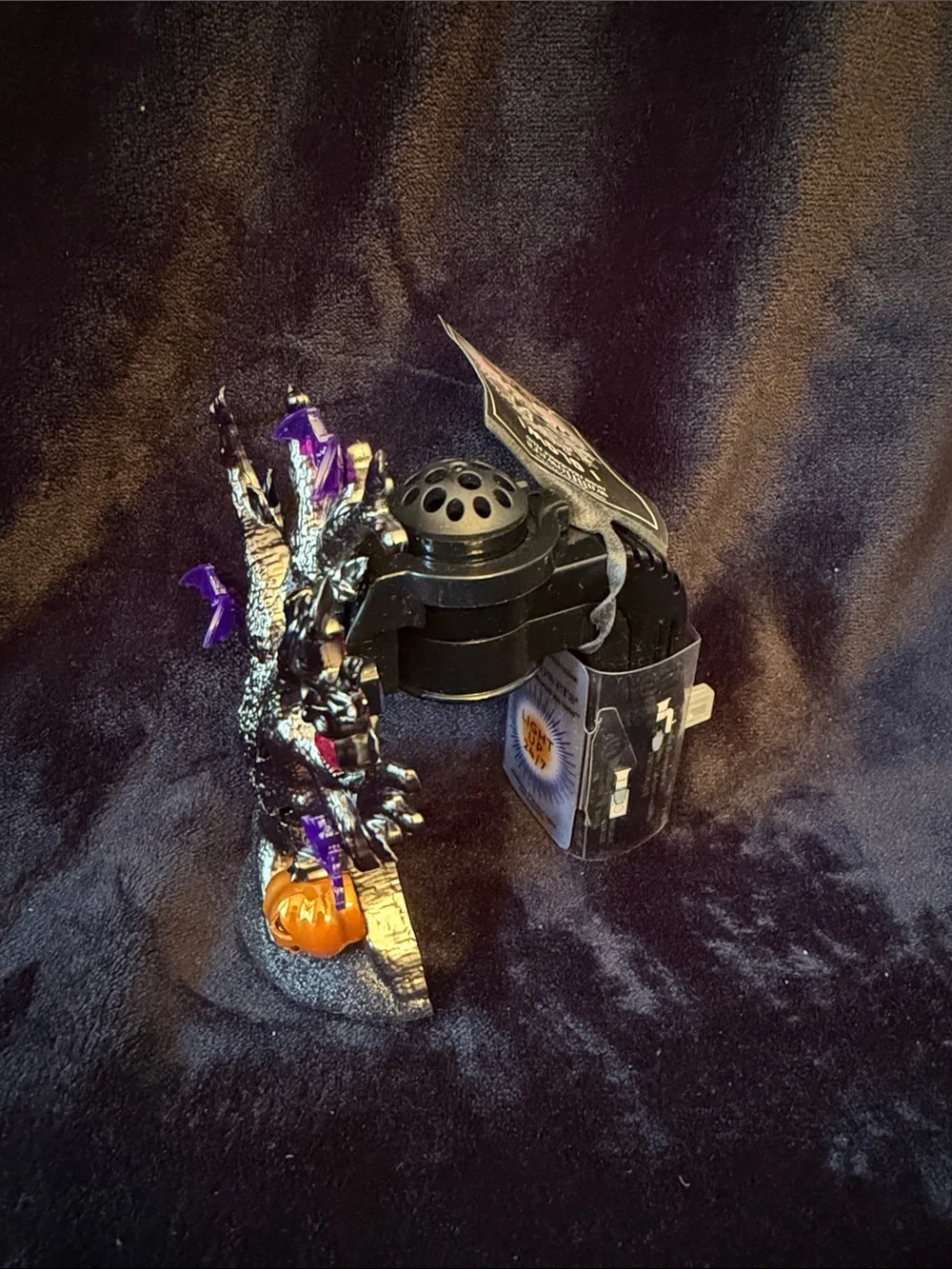 Bath & Body Works Black and Purple Halloween Plug-In Fragrance Warmer.